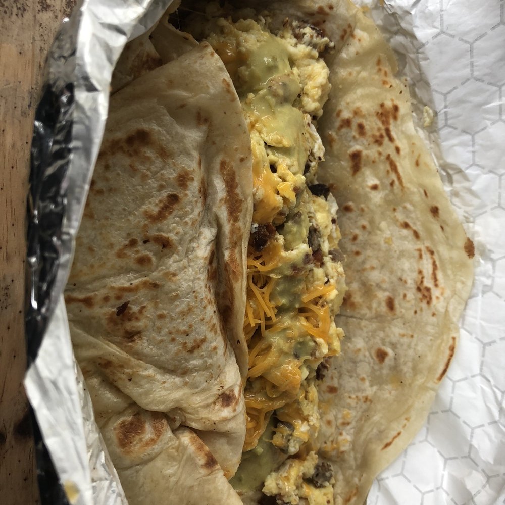 Con Madre Kitchen - Egg, bacon, sausage, and cheese burrito. - Mexican Near Me - Austin, Texas Con Madre Kitchen - Egg, bacon, sausage, and cheese burrito. - Mexican Near Me - Austin, Texas