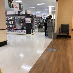 TJ Maxx - Double duty - dressing room attendant doing restock at the same time