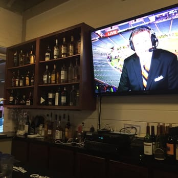 The Ludlow Garage - Huge tv in the bar!!! Great wine. Mine was chilled and yummy - Music Venues Near Me - Cincinnati, Ohio