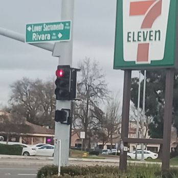 Kik Basil - a 7 eleven sign and a 7 eleven sign - Thai Near Me Kik Basil - a 7 eleven sign and a 7 eleven sign - Thai Near Me