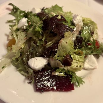 The Capital Grille - Roasted Beet and Goat Cheese Salad with Crushed Pistachios and Citrus Vinaigrette - Steakhouses Near Me - Costa Mesa, California