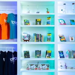 Our shelves of books, paraphernalia and merch!