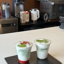 Iced strawberry matcha and matcha cream on top Iced strawberry matcha and matcha cream on top