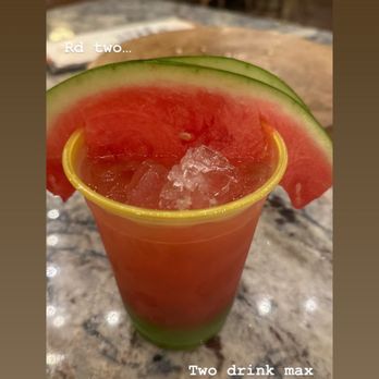 Magic Key Terrace - Magic Key Holder Dining - Heimlich Chew Chew Juice normally a Non-Alcoholic drink but we added a shot of tequila *chefs kiss!* - Wine Bars Near Me - Anaheim, California