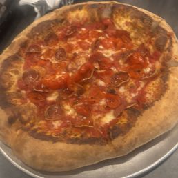 Pizza. Very good. Light cheese.