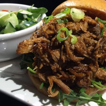 Smith & Kings - "Slow-Roasted BBQ Pulled Pork Sandwich" with market salad. - Cocktail Bars Near Me - Honolulu, Hawaii Smith & Kings - "Slow-Roasted BBQ Pulled Pork Sandwich" with market salad. - Cocktail Bars Near Me - Honolulu, Hawaii