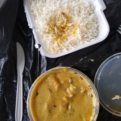 Intranational Friends' Bar & Restaurant - Chicken Korma with rice.  My dad tried some of it and IMMEDIATELY told me to eat it myself