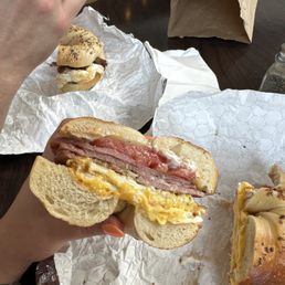Pork egg and cheese bagel with tomato