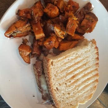 Wright Square Bistro - Roast beef panini with a side of rosemary pecan sweet potatoes. - Southern Near Me - Savannah, Georgia Wright Square Bistro - Roast beef panini with a side of rosemary pecan sweet potatoes. - Southern Near Me - Savannah, Georgia