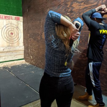Lumber Axe - Birthday girl with an axe! - Axe Throwing Near Me - Des Moines, Iowa