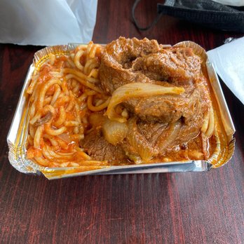 Yoly Restaurant - a tray of food on a table - Latin American Near Me - Bronx, New York