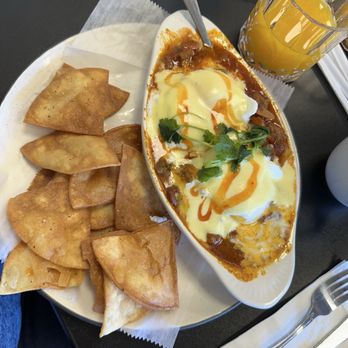 The Rhody Hen Cafe - Loaded Chilli Skillet w poached eggs! - Breakfast & Brunch Near Me - North Providence, Rhode Island