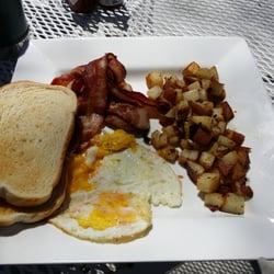 The Canvas Cafe - Applewood smoked bacon & eggs out on the patio.  Perfection!