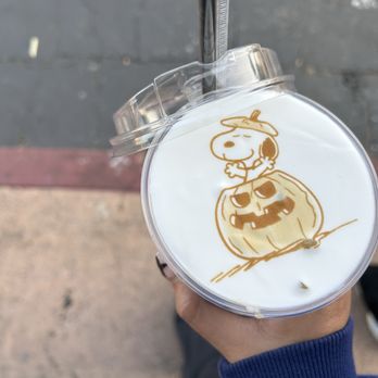 Pana's Cafe - Cookie butter latte with snoopy design which - Desserts Near Me - Bellflower, California