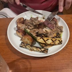 Beef tenderloin with mushroom blue cheese gravy