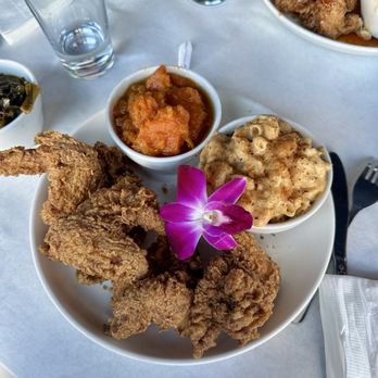 Chef Smelly's - 4 piece wings with mac and cheese / yams and a side of collard greens - Cajun/Creole Near Me - Oakland, California Chef Smelly's - 4 piece wings with mac and cheese / yams and a side of collard greens - Cajun/Creole Near Me - Oakland, California