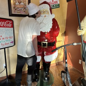 Rico's Pizza - Ray kissing Santa - Pizza Near Me - Gold Bar, Washington