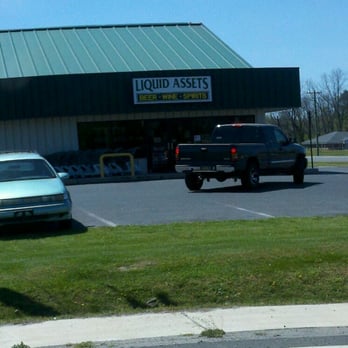 Liquid Assets - a car parked in front of a liquor store - Beer, Wine & Spirits Near Me - Seaford, Delaware Liquid Assets - a car parked in front of a liquor store - Beer, Wine & Spirits Near Me - Seaford, Delaware