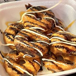 Hot Wok - Mini donuts glazed with chocolate, caramel,and vanilla