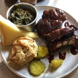 Rib plate with greens and mashed potato salad Rib plate with greens and mashed potato salad