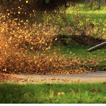 Premium Landscaping & Maintenance - a man using a leaf blower - Landscaping Near Me Premium Landscaping & Maintenance - a man using a leaf blower - Landscaping Near Me