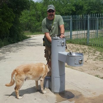 Comanche Lookout Park - My Hubs with one of our labs using one of the water stations. - Parks Near Me - San Antonio, Texas