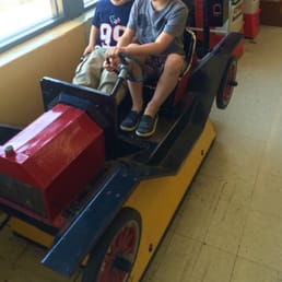 Riding the 10 cent mechanical car Riding the 10 cent mechanical car