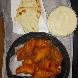 Chicken Feastin - Dinner Fried Buffalo wings  Pita bread  Hummus