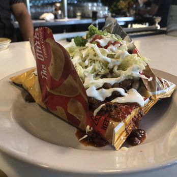 Bang Bang Kitchen - New Mexico Frito Pie - on happy hour! - New Mexican Cuisine Near Me - Seattle, Washington Bang Bang Kitchen - New Mexico Frito Pie - on happy hour! - New Mexican Cuisine Near Me - Seattle, Washington