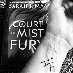 Black Diamond Studios - The final outcome. The tattoo itself is based on the book pictured.