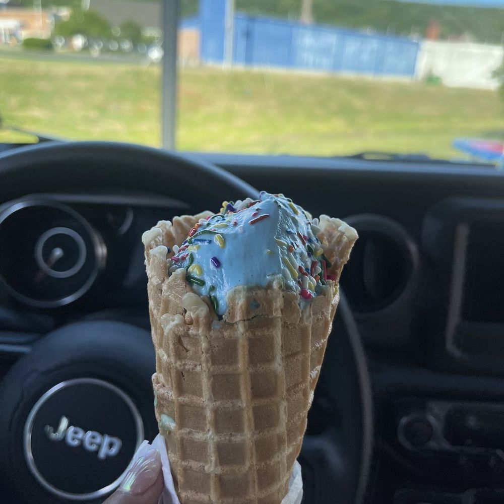 Junior Cookie Monster waffle cone with rainbow sprinkles Junior Cookie Monster waffle cone with rainbow sprinkles