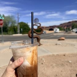 Snake Oil Coffee Company - Delicious coffee, stunning views. Vin Mariani with almond milk