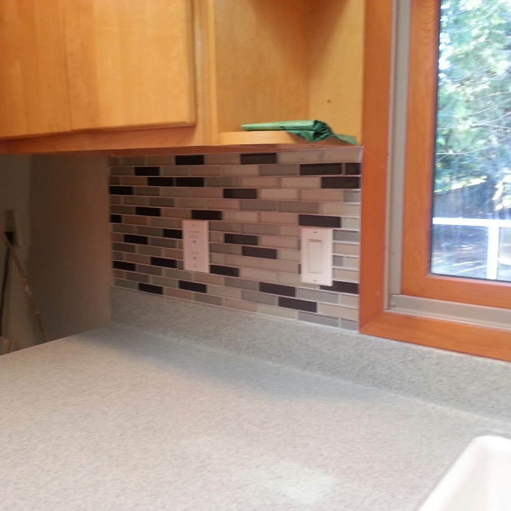 Seattle Grout - One side of the kitchen sink - tile installed. - Grout Services Near Me - Bothell, Washington Seattle Grout - One side of the kitchen sink - tile installed. - Grout Services Near Me - Bothell, Washington