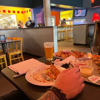 Mellow Mushroom - People standing around on their phones and chatting. - Pizza Near Me - Winston-Salem, North Carolina Mellow Mushroom - People standing around on their phones and chatting. - Pizza Near Me - Winston-Salem, North Carolina