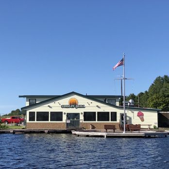 Sunset Grill - Exterior of the Sunset Grill from Big Stone Lake - American Near Me - Three Lakes, Wisconsin