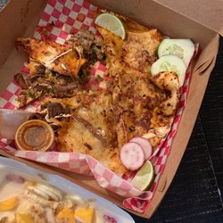 Taquiza la Guadalupana - Birria pizza is beyond delicious.