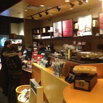 Starbucks - a man and a woman standing in a coffee shop - Coffee & Tea Near Me - Barrie, Ontario Starbucks - a man and a woman standing in a coffee shop - Coffee & Tea Near Me - Barrie, Ontario