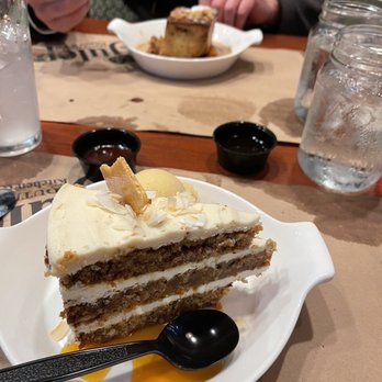 Julep Kitchen & Bar - Hummingbird Cake with a scoop of pineapple sorghum sorbet. - Barbeque Near Me - Annapolis, Maryland