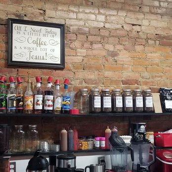 Dougie's Coffee Shop - Just some of the flavorings and that brick wall - Coffee & Tea Near Me - Davison, Michigan