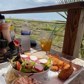 The Deck - Coconut shrimp and house salad with a view!! - New American Near Me - Tybee Island, Georgia The Deck - Coconut shrimp and house salad with a view!! - New American Near Me - Tybee Island, Georgia