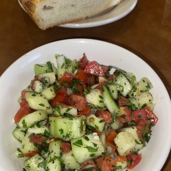 Babani's Kurdish Restaurant - Traditional Silopi Salad (cucumber tomato salad with parsley + more). Goes amazing with the other items - Halal Near Me - Saint Paul, Minnesota Babani's Kurdish Restaurant - Traditional Silopi Salad (cucumber tomato salad with parsley + more). Goes amazing with the other items - Halal Near Me - Saint Paul, Minnesota