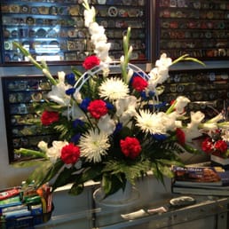 Beautiful red, white and blue arrangement for a US Air Force Veteran's memorial service. Beautiful red, white and blue arrangement for a US Air Force Veteran's memorial service.