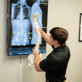 Gonstead Chiropractic Clinic - Dr. Steven analyzing an X-Ray - Chiropractors Near Me - Pembroke Pines, Florida Gonstead Chiropractic Clinic - Dr. Steven analyzing an X-Ray - Chiropractors Near Me - Pembroke Pines, Florida