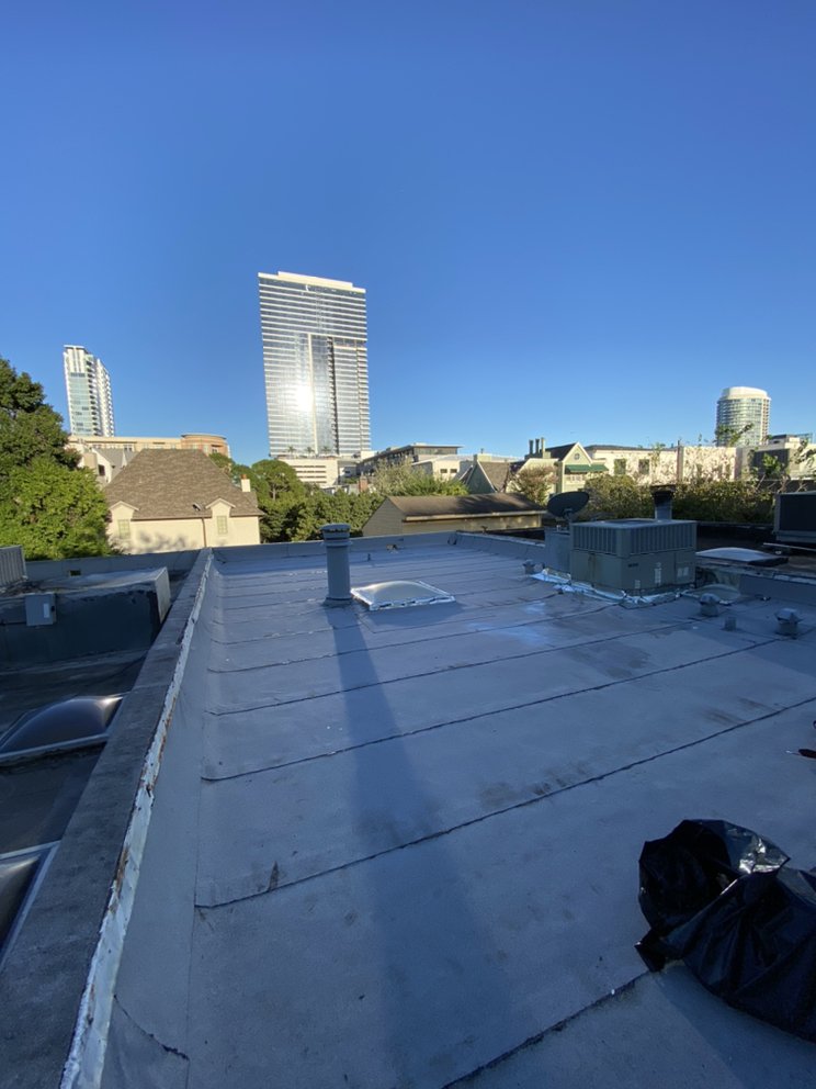 Slide of Quality King Roofing