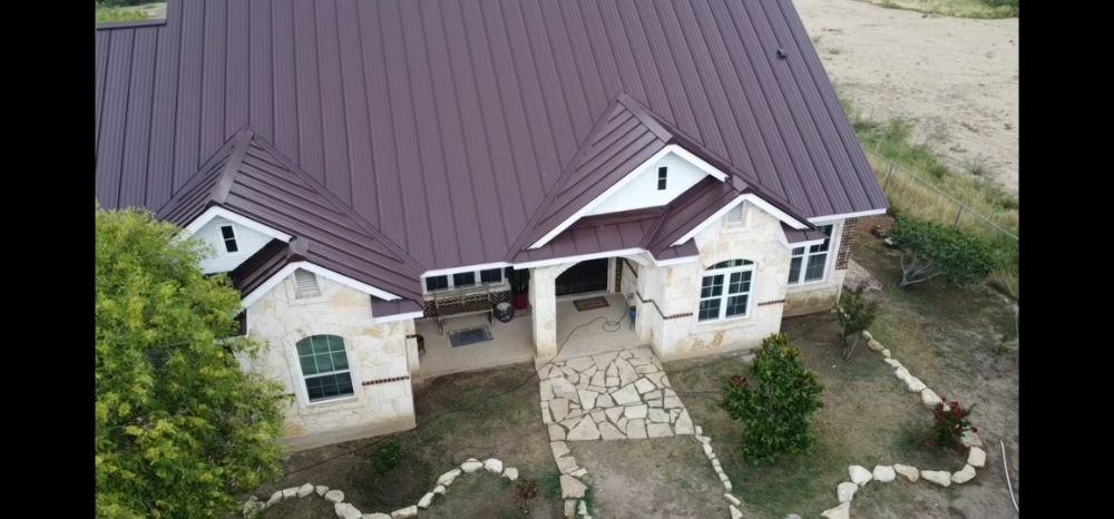Slide of Metal Master Roofing