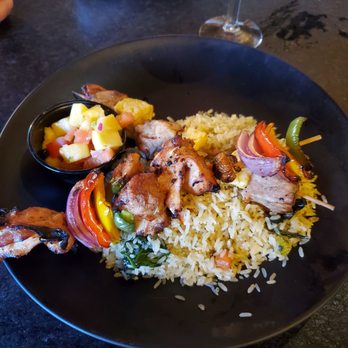 Riverhouse - Teriyaki chicken & pork and pineapple skewers over rice with pineapple salsa - New American Near Me - Taunton, Massachusetts