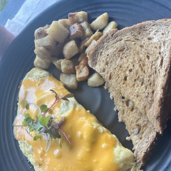 Vanessa's Coffee Shop - Omelette , breakfast potatoes and wheat bread - Breakfast & Brunch Near Me - Orlando, Florida Vanessa's Coffee Shop - Omelette , breakfast potatoes and wheat bread - Breakfast & Brunch Near Me - Orlando, Florida