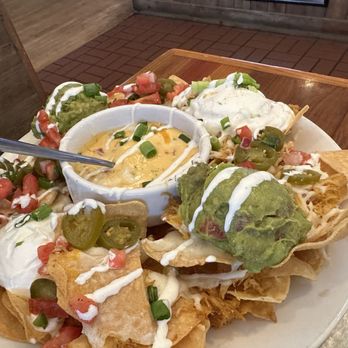 Miller's Ale House - MEGA-MEX TEX-MEX CHICKEN NACHOS - Sports Bars Near Me - Jacksonville, Florida Miller's Ale House - MEGA-MEX TEX-MEX CHICKEN NACHOS - Sports Bars Near Me - Jacksonville, Florida