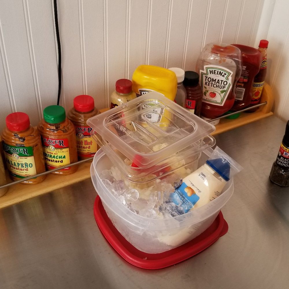Dockside Dogs - Mustard up front and ketchup is in the back. Love me some beaver brand mustard. - Hot Dogs Near Me - Anacortes, Washington