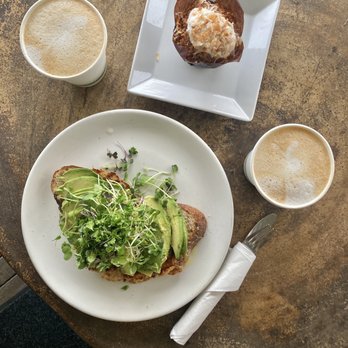 Hanalei Bread Company - 2 oat Cappuccinos, Avocado Toast (with local micro greens) & Coconut Chia Muffin (vegan & GF) - Breakfast & Brunch Near Me - Hanalei, Hawaii Hanalei Bread Company - 2 oat Cappuccinos, Avocado Toast (with local micro greens) & Coconut Chia Muffin (vegan & GF) - Breakfast & Brunch Near Me - Hanalei, Hawaii